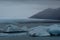 Close up of blue icebergs at JÃ¶kulsÃ¡rlÃ³n glacial lagoon, Iceland, close to the glacier.