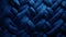 A close up of a blue knitted fabric texture