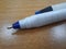 close up of a blue pencil, blue ballpoint pen
