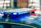 Close up on the blue and red emergency lights on a modern police patrol