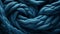 A close up of a blue yarn texture