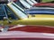 Close up of the bonnets and windscreens of a row of vintage triumph stag sports cars at hebden bridge vintage weekend public vehic