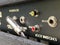 Close-up the boost input jack of a back control panel electric guitar amplifier with blurred another control panel black