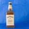 Close-up a bottle of Jack Daniels Tennessee Honey isolated