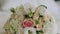 Close-up of a bouquet of fresh flowers lying on the table.