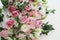 Close-up of Bouquet of Freshly Pink and White cut Beautiful Garden Roses. Bride or Wedding Bouquet.