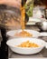 Close-up of a bowl of bolognese pasta.