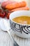 Close up of a bowl of carrot, pumkin and sweet potato soup