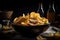 close-up of bowl of crispy, golden chips with salt and pepper