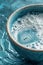 A close up of a bowl filled with water and soap, AI