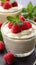 A close up of a bowl of food with raspberries, Valentine's day desserts.