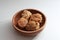 a close up of a bowl of fried stuffed tofu