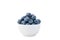 Close up of bowl full of blueberries isolated on white background. Ripe blueberry plate. Organic and healthy food