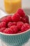 Close up of bowl of raspberries