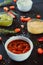 Close up bowl with Salsa sause with mayo sour cream, guacamole, cheese dipping sauces with ingredients and spices on the