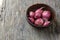 close up of a bowl of shallots