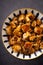 Close-up of a bowl of steaming hot, freshly cooked Mapo tofu