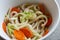 Close up bowl of udon noodle soup