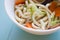 Close up bowl of udon noodle soup