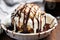 close up of a bowl of vanilla ice cream with chocolate syrup
