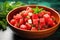 close-up of a bowl of watermelon salad with mint leaves