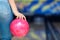 Close-up of a bowling ball in a girl`s hand