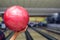 Close-up of a bowling ball in a girl`s hand