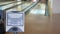 Close-up of bowling control panel with blurred man on background throwing ball on a track lane. selective focus