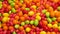 Close up of bowls filled with a large selection of different colored soft candies