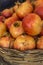 Close-up of box with many Italian pomegranates in fair