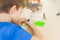 Close up of boy creating a diamond mosaic