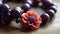 a close up of a bracelet with beads and a flower on a wooden table with a beaded bracelet on it and a beaded bracelet with beads