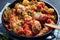 Close-up of braised hake in a black pan