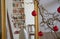 Close up of a branch with christmas balls, reflections in a mirror with golden frame, loft apartment