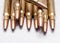 A close up of brass rifle bullets used for hunting