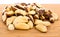 A close-up of Brazil nuts on a white background