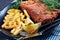 Close-up of Breaded hake fillet on a plate