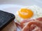 Close up breakfast with nutritious have Bread Charcoal,toast,bacon and egg on a white plate