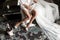 Close-up bridal shoes, champagne, dress and veil, best accessories for bride for wedding morning preparation