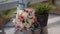 Close up of bride bouquet of fresh flowers on glass round table