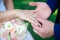 Close-up Bride and groom`s hands with wedding rings