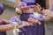 Close up of bridesmaids hands with bouquet