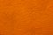 close up of bright grunge Orange Roughy stucco wall texture background