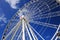 Close-up of Brisbane Wheel on sunny day, blue sky