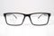 Close up of broken black glasses on a white background. vision examination and repair