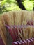 Close-up of a broom and a rake