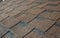 Close up on brown asphalt shingles roof. Roofing Construction