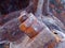 Close up of brown rusted threaded bolts and nuts on old corroded machinery