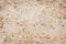 Close up brown or white mixed small rock patterns texture wall on background