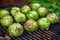 close-up of brussel sprouts grilling on a charcoal bbq